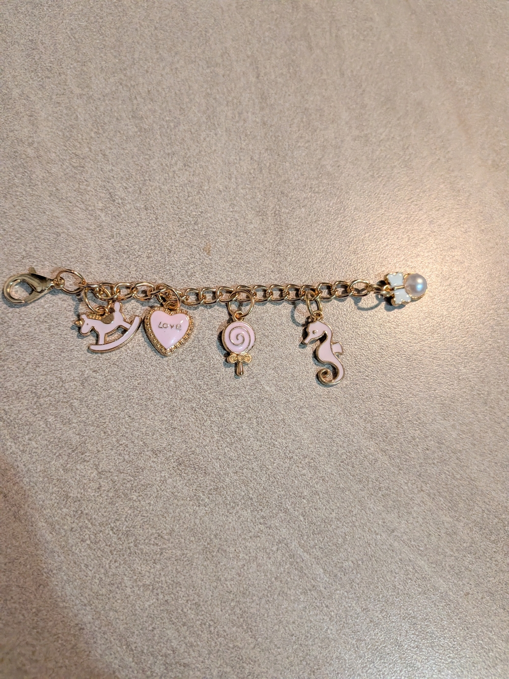 Gold Charm Bracelet with Pink Enamel Charms